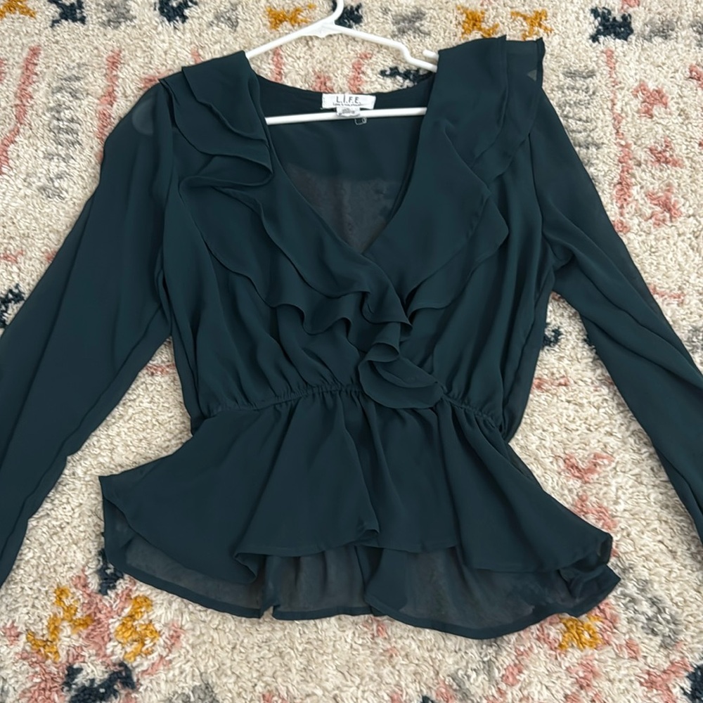 teal blouse